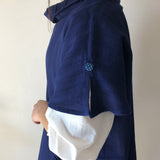 タートルネックベスト